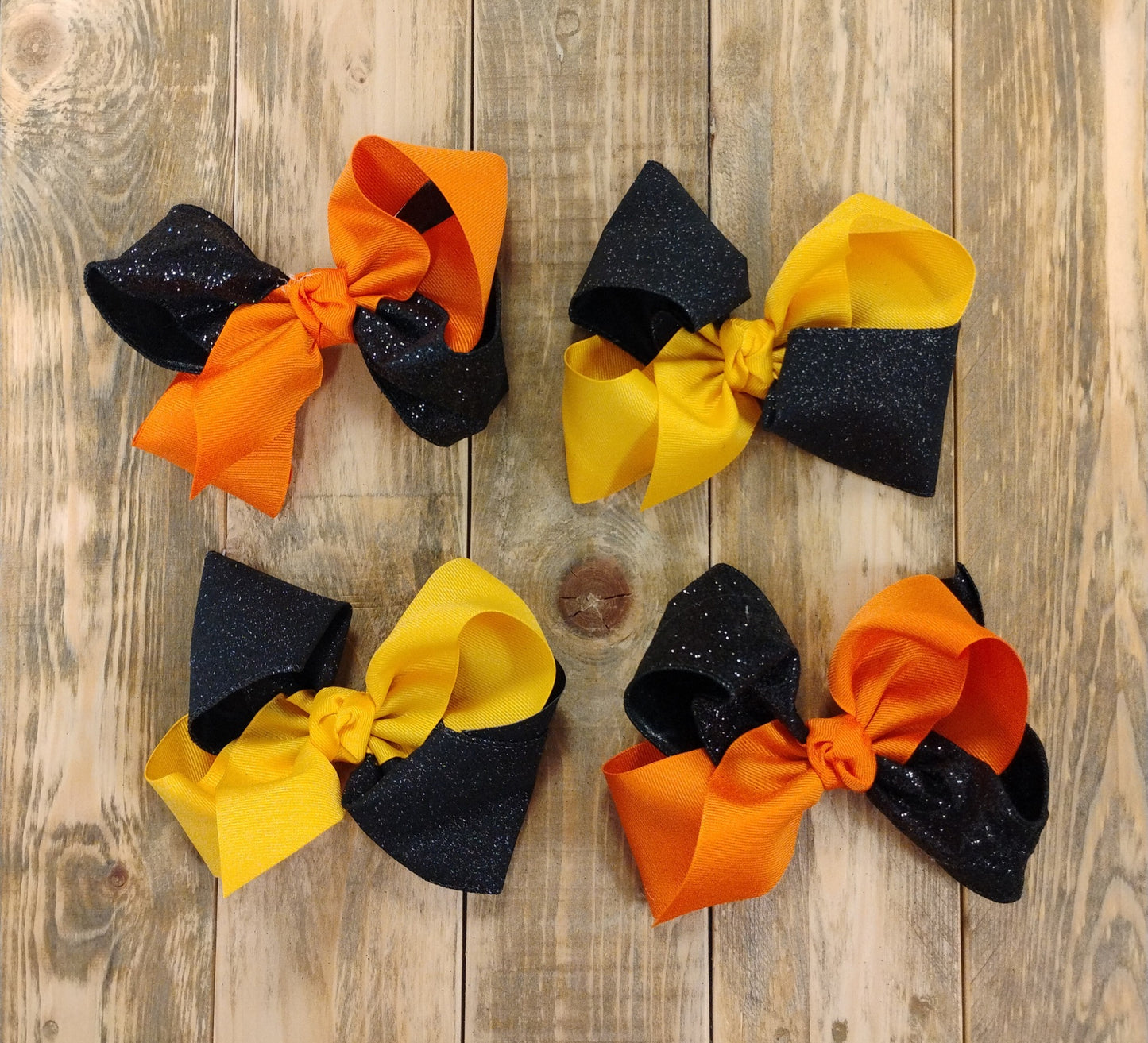 5.5" Glitter Black/Orange, Black/Yellow Bows